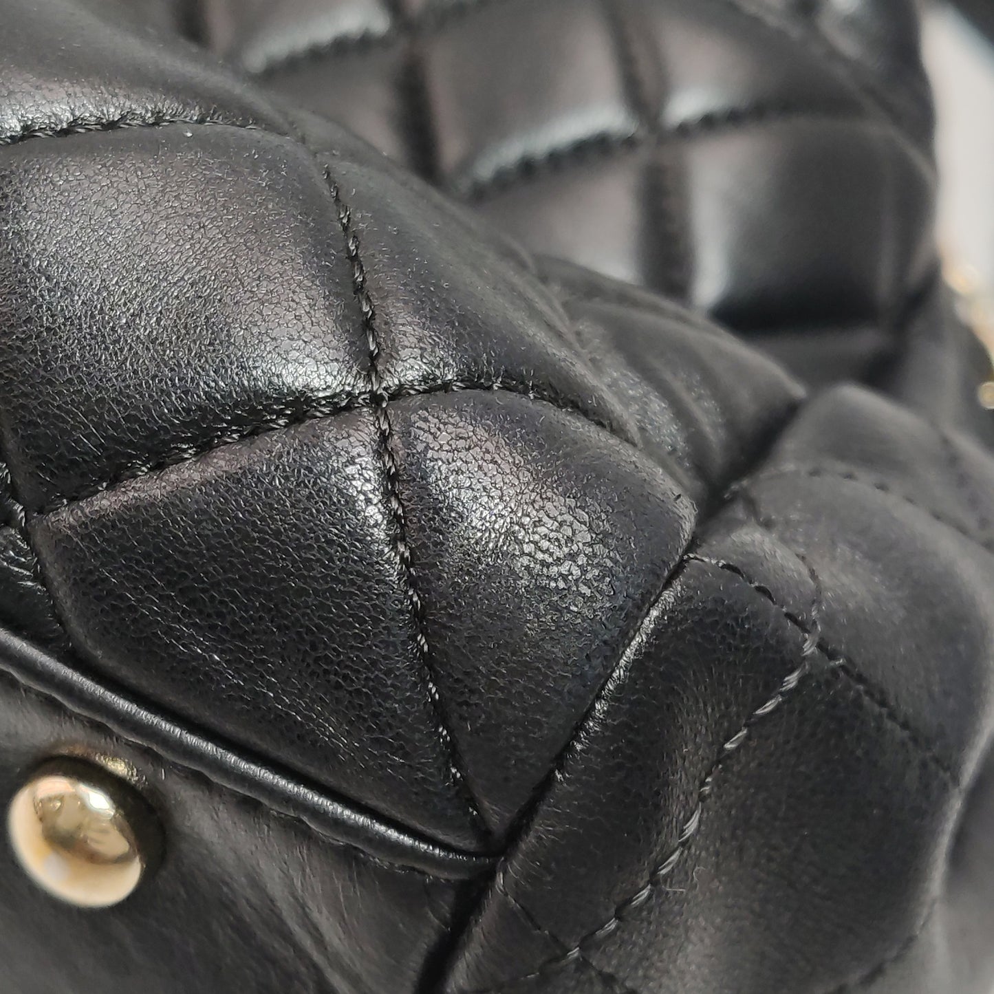 CHANEL LAMBSKIN QUILTED DRAWSTRING BAG